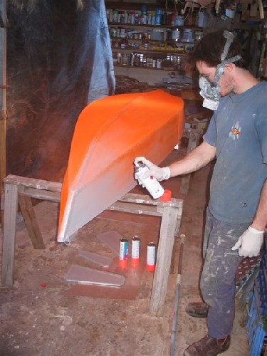 Spray painting the PAC fluoro rescue orange - so bright it hurts to look at it!
